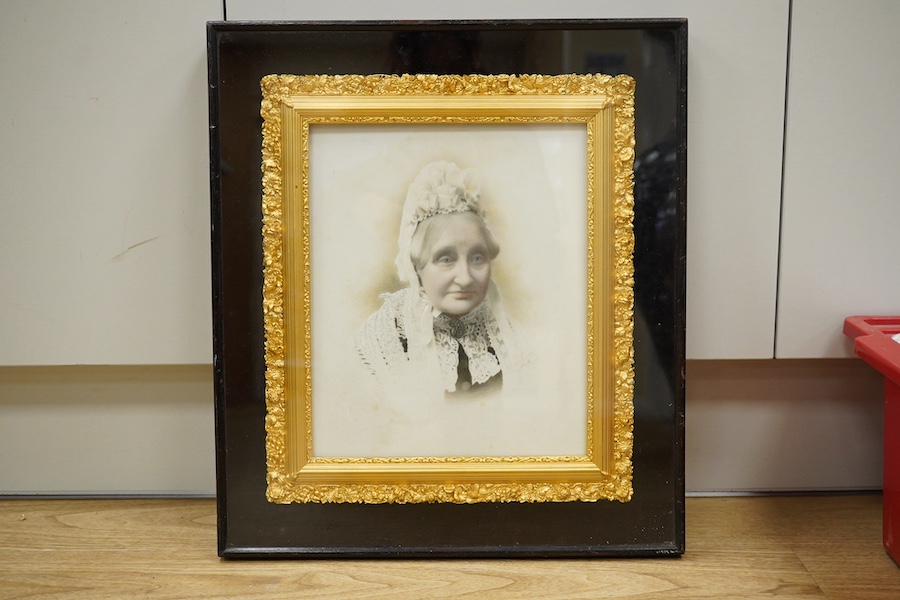 J. Berryman of Bath, watercolour photographic portrait on porcelain panel, lady wearing a bonnet, original gilt frame, overall 47 x 41cm. Condition - fair to good